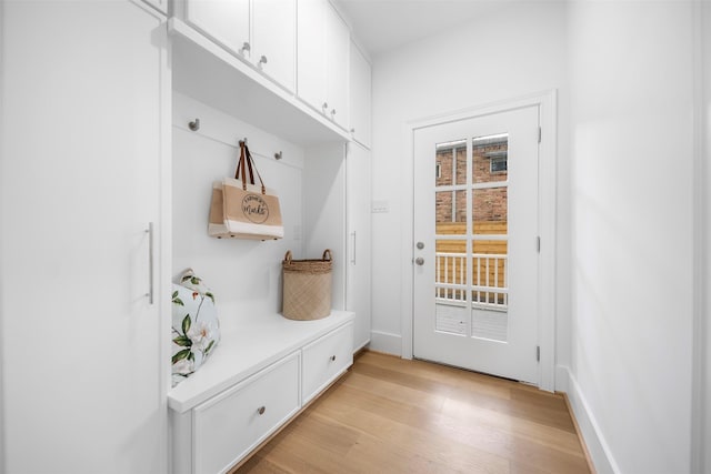 mudroom featuring light wood-style floors