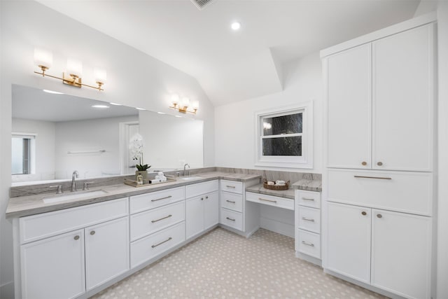 full bathroom with vaulted ceiling, double vanity, and recessed lighting