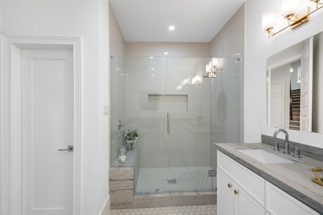 608 W Main St, Houston, TX 77006 - bathroom featuring vanity, a stall shower, and tile patterned floors