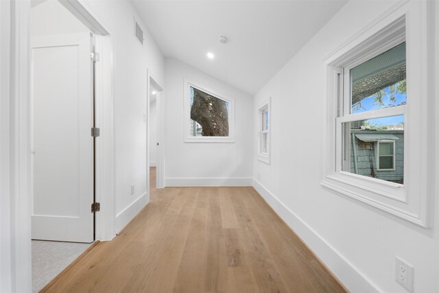 608 W Main St, Houston, TX 77006 - hallway with light wood-style flooring, baseboards, and recessed lighting