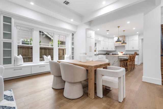 608 W Main St, Houston, TX 77006 - dining space featuring recessed lighting and light wood finished floors