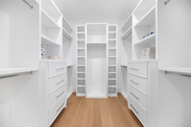 608 W Main St, Houston, TX 77006 - spacious closet with light wood finished floors