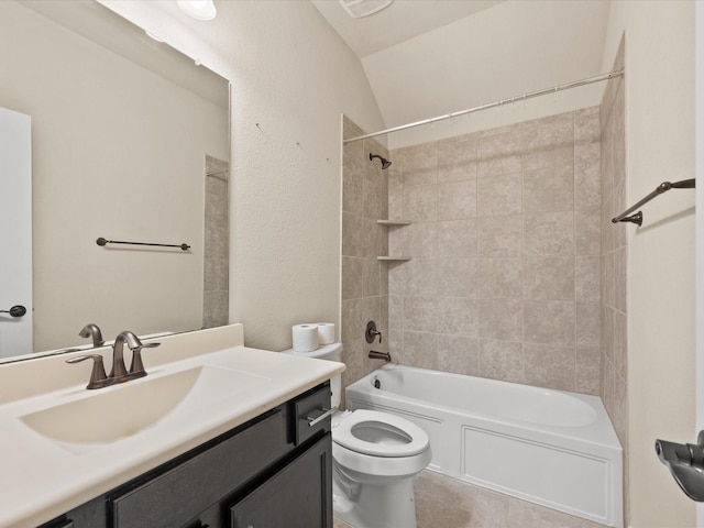 bathroom featuring toilet, shower / bathtub combination, tile patterned floors, vanity, and lofted ceiling