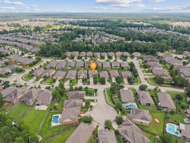 aerial overview of property's location with nearby suburban area