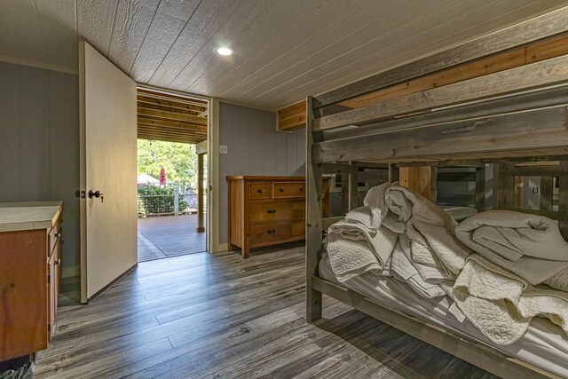 470 S Lakeview Dr, Point Blank, TX 77364 - bedroom featuring wood ceiling, access to exterior, wooden walls, wood finished floors, and recessed lighting