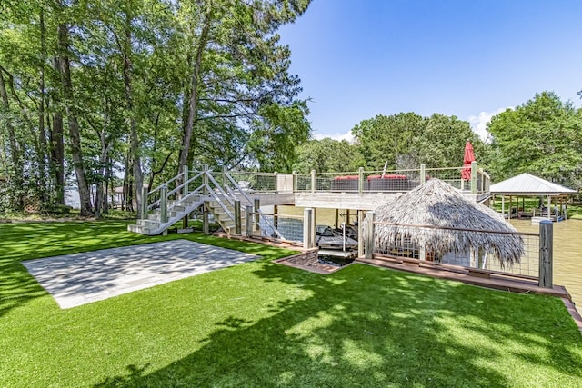 470 S Lakeview Dr, Point Blank, TX 77364 - back of house with a lawn, a gazebo, and stairs