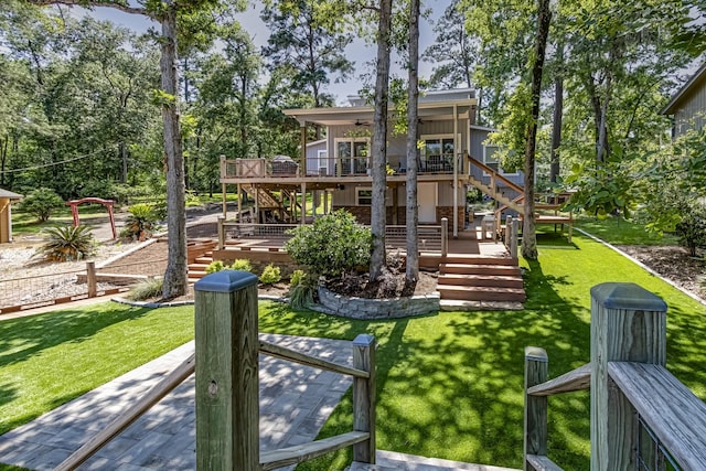 470 S Lakeview Dr, Point Blank, TX 77364 - view of jungle gym featuring stairway, a deck, a yard, and ceiling fan