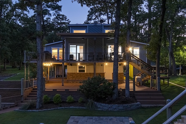470 S Lakeview Dr, Point Blank, TX 77364 - rear view of house featuring stairway, a yard, a deck, and a ceiling fan