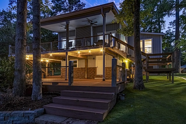 470 S Lakeview Dr, Point Blank, TX 77364 - rear view of property with ceiling fan, a yard, a wooden deck, and board and batten siding