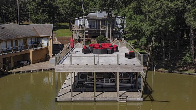 470 S Lakeview Dr, Point Blank, TX 77364 - dock with stairs, boat lift, a deck with water view, and an outdoor living space