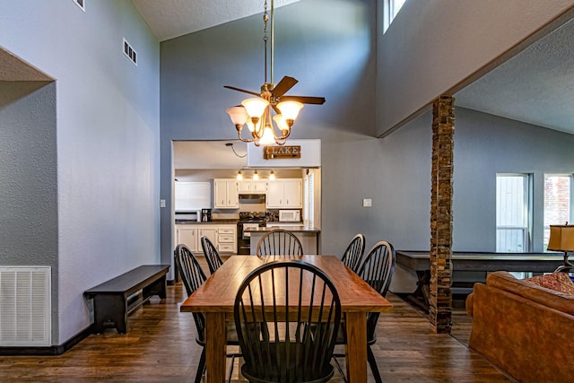 470 S Lakeview Dr, Point Blank, TX 77364 - dining space featuring ceiling fan, dark wood-style flooring, high vaulted ceiling, baseboards, and ornate columns