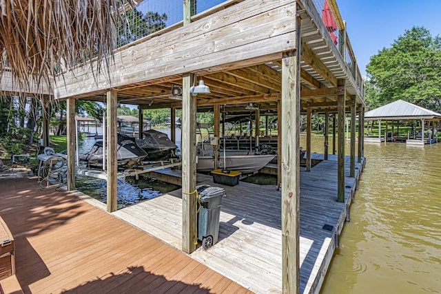 470 S Lakeview Dr, Point Blank, TX 77364 - dock area with boat lift and a water view