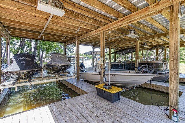 470 S Lakeview Dr, Point Blank, TX 77364 - dock area featuring boat lift