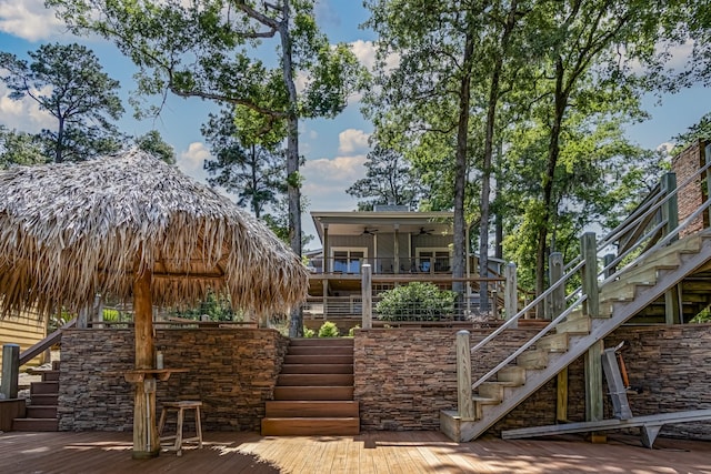 470 S Lakeview Dr, Point Blank, TX 77364 - rear view of property featuring stairway, a ceiling fan, a wooden deck, and board and batten siding