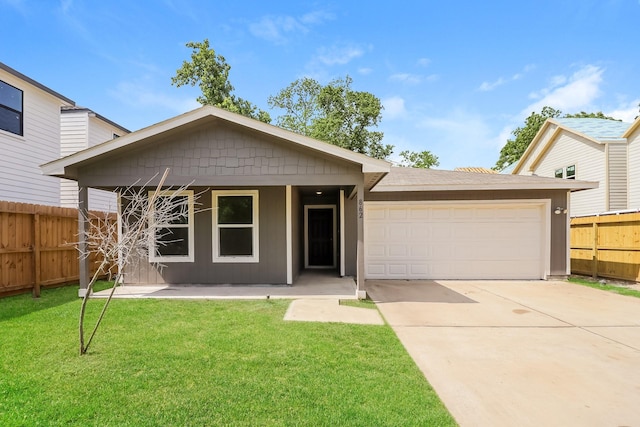 862 Rachel St, Houston, TX 77091 - view of front facade featuring a garage and driveway