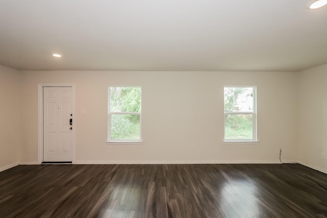 862 Rachel St, Houston, TX 77091 - spare room with dark wood finished floors, plenty of natural light, baseboards, and recessed lighting
