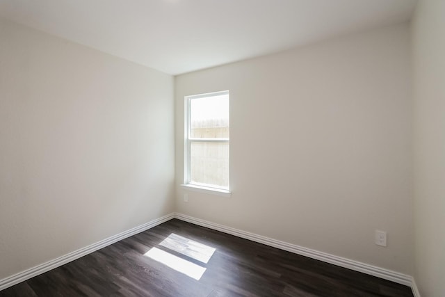 862 Rachel St, Houston, TX 77091 - spare room with dark wood finished floors and baseboards