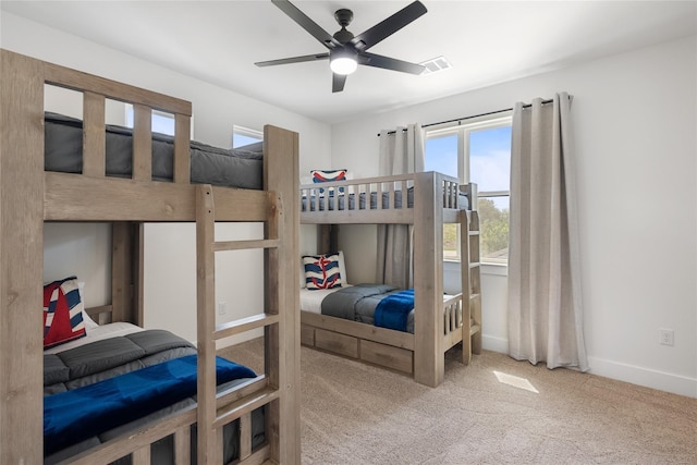 18605 Lakeland Dr, Point Venture, TX 78645 - bedroom with carpet, baseboards, and a ceiling fan
