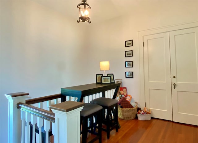 dining space with wood finished floors