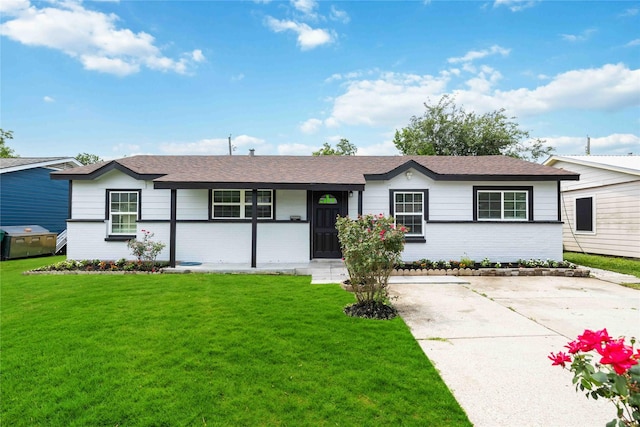 508 Kalmer St, Pasadena, TX 77502 - ranch-style house with brick siding, a front lawn, a shingled roof, and a porch