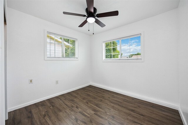 508 Kalmer St, Pasadena, TX 77502 - unfurnished room featuring dark wood-type flooring, baseboards, and ceiling fan