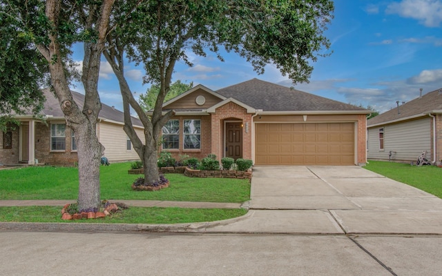 10406 Tenleyton Ln, Houston, TX 77075 - view of front of property with brick siding, an attached garage, driveway, a front yard, and a shingled roof