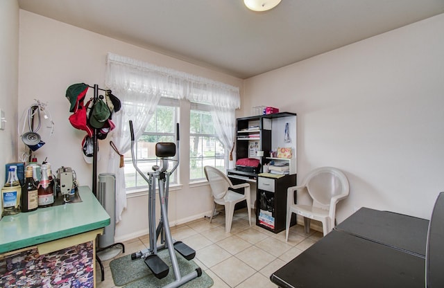 10406 Tenleyton Ln, Houston, TX 77075 - home office with light tile patterned flooring and baseboards