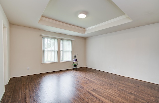 10406 Tenleyton Ln, Houston, TX 77075 - unfurnished room with a raised ceiling, ornamental molding, wood-type flooring, and baseboards