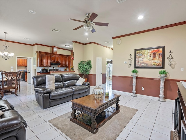 21007 Cook Rd, Tomball, TX 77377 - living room featuring a ceiling fan, ornamental molding, a chandelier, light tile patterned floors, and recessed lighting