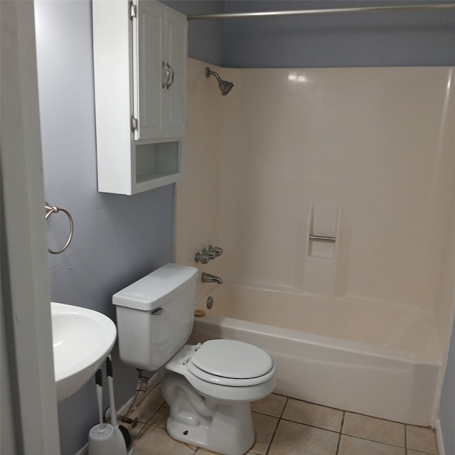 18 Townhouse Ln Unit 18, Trinity, TX 75862 - full bathroom with tile patterned flooring, toilet, and shower / tub combination