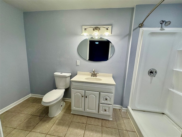 18 Townhouse Ln Unit 18, Trinity, TX 75862 - bathroom with a shower, tile patterned flooring, baseboards, and vanity