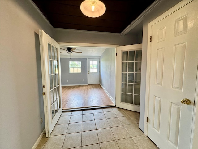 18 Townhouse Ln Unit 18, Trinity, TX 75862 - hall featuring light tile patterned floors, ornamental molding, and baseboards
