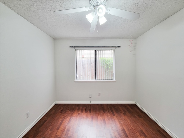 18515 Sweetmeadow Dr, Spring, TX 77379 - empty room with wood finished floors, a ceiling fan, a textured ceiling, and baseboards