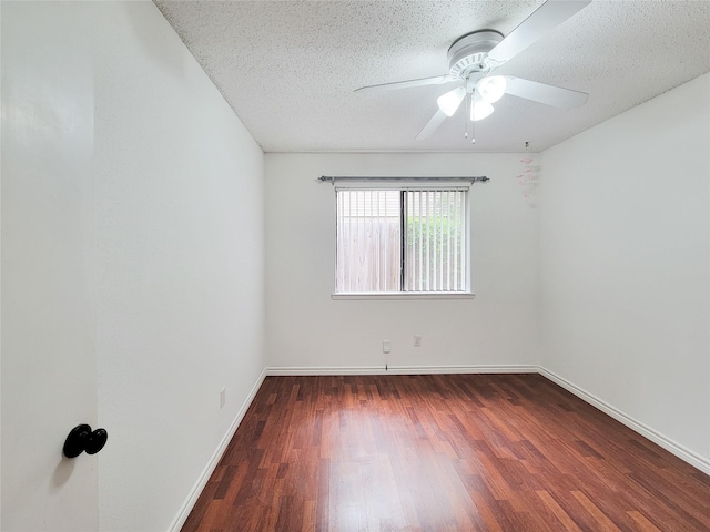 18515 Sweetmeadow Dr, Spring, TX 77379 - spare room featuring wood finished floors, a textured ceiling, a ceiling fan, and baseboards
