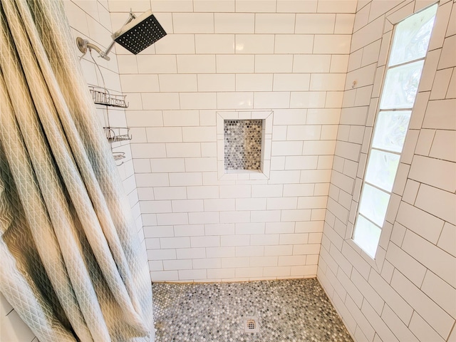 18515 Sweetmeadow Dr, Spring, TX 77379 - bathroom featuring healthy amount of natural light and tiled shower