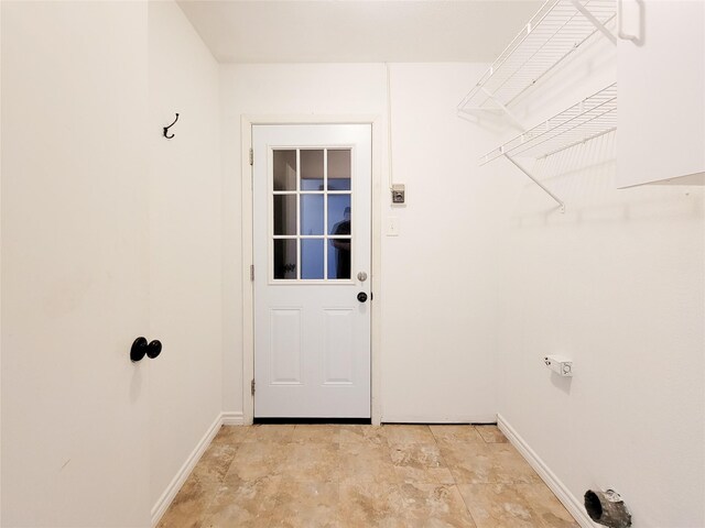 18515 Sweetmeadow Dr, Spring, TX 77379 - clothes washing area with baseboards
