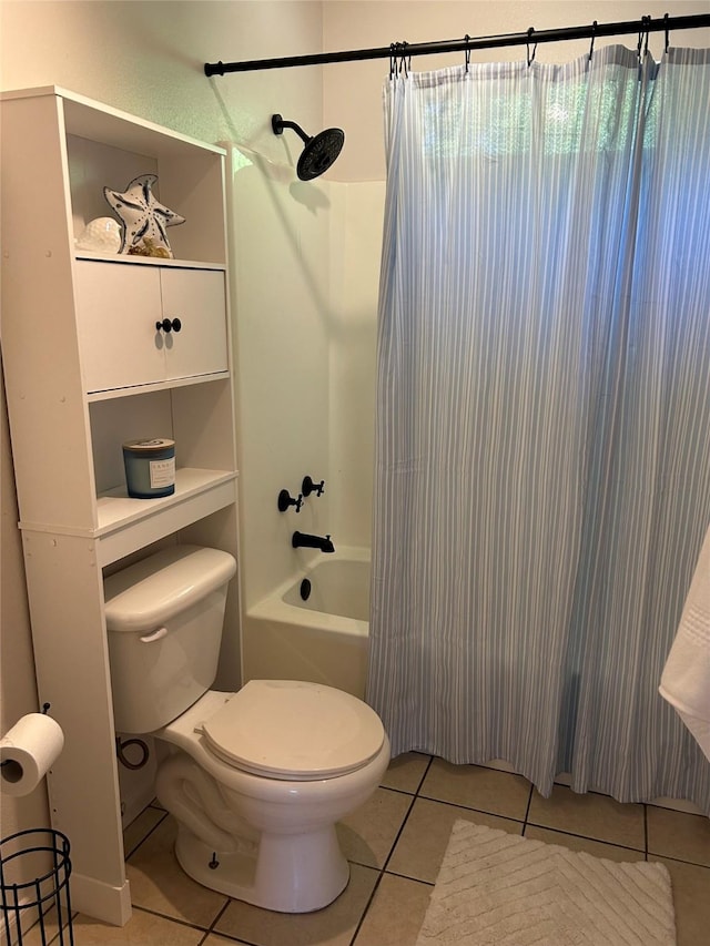 2610 Daugherty St, Waller, TX 77484 - bathroom featuring tile patterned floors, toilet, and shower / bathtub combination with curtain