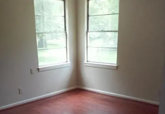 406 Poinsetta St, Lake Jackson, TX 77566 - unfurnished room featuring baseboards
