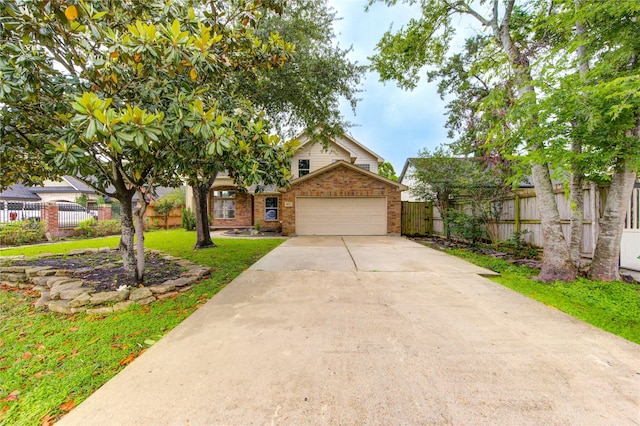 6613 Whitton Dr, Houston, TX 77085 - view of front of house with brick siding, concrete driveway, and a garage