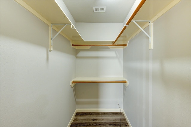 6613 Whitton Dr, Houston, TX 77085 - spacious closet with wood finished floors