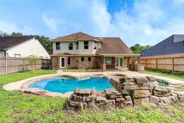 6613 Whitton Dr, Houston, TX 77085 - view of pool with french doors, a fenced backyard, and a patio