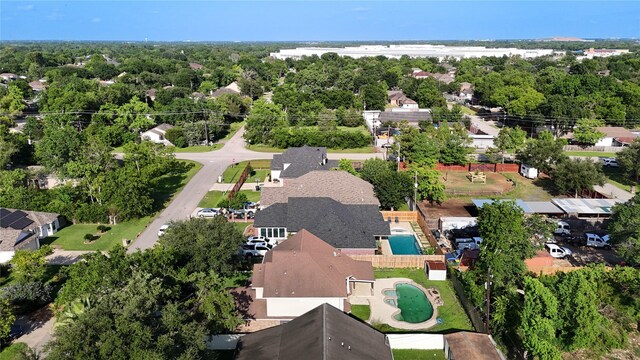 6613 Whitton Dr, Houston, TX 77085 - aerial perspective of suburban area featuring a pool area