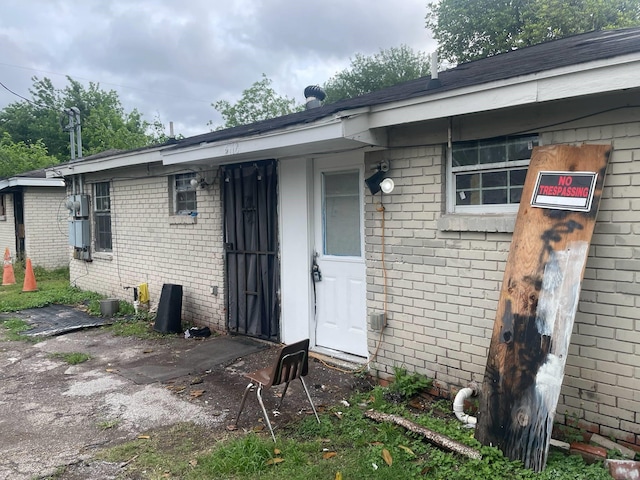 5118 Mallow St, Houston, TX 77033 - property entrance featuring brick siding