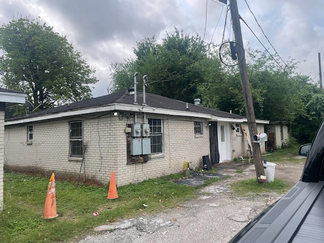 5118 Mallow St, Houston, TX 77033 - view of side of property featuring brick siding
