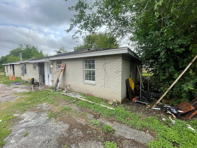 5118 Mallow St, Houston, TX 77033 - view of front of house featuring brick siding