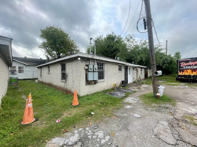 5118 Mallow St, Houston, TX 77033 - view of side of home with brick siding