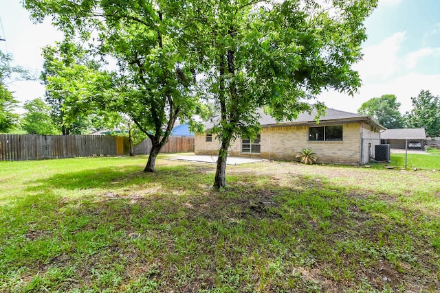 9923 Valley Sun Dr, Houston, TX 77078 - view of yard featuring cooling unit and a patio