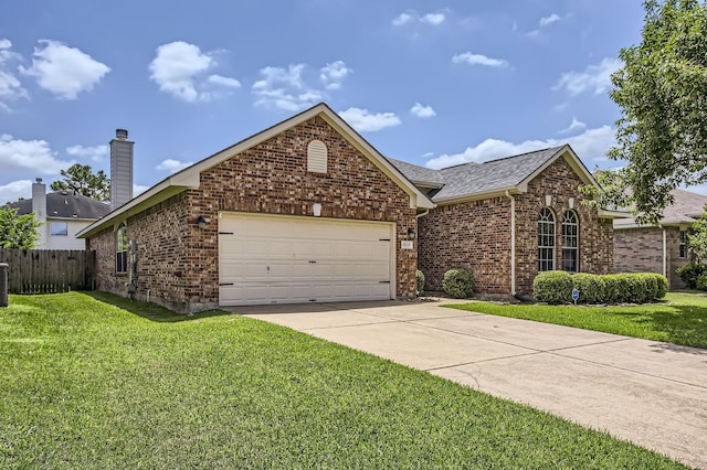 18115 Linden Forest Ln, Katy, TX 77449 - view of front of property featuring an attached garage, brick siding, driveway, and a shingled roof