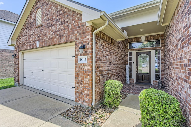 18115 Linden Forest Ln, Katy, TX 77449 - doorway to property featuring brick siding, driveway, and a garage