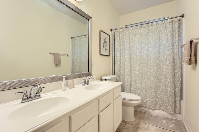 18115 Linden Forest Ln, Katy, TX 77449 - full bath with tile patterned floors, toilet, double vanity, and shower / bath combination with curtain